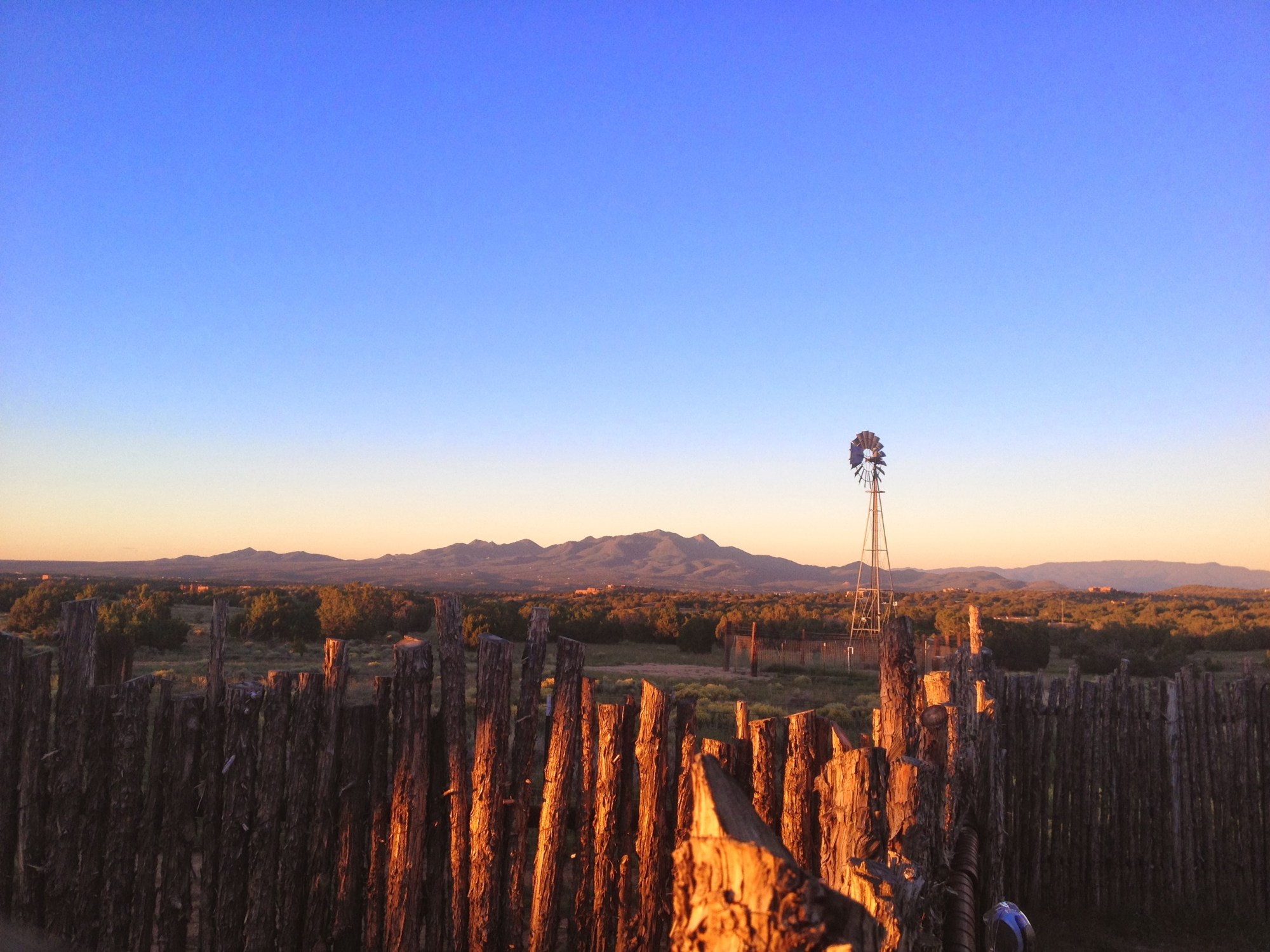 santa fe, new mexico sunrise with windmill